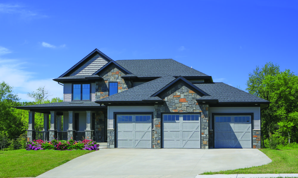 nice house in Kalispell montana with carriage house garage doors